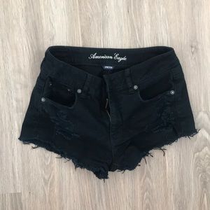 Distressed black shorts